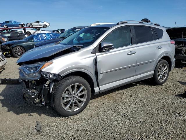 2T3YFREV1HW320509 - 2017 TOYOTA RAV4 LIMITED SILVER photo 1