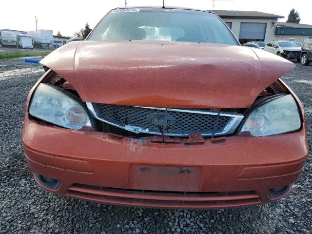 3FAFP37N95R157435 - 2005 FORD FOCUS ZX5 ORANGE photo 5