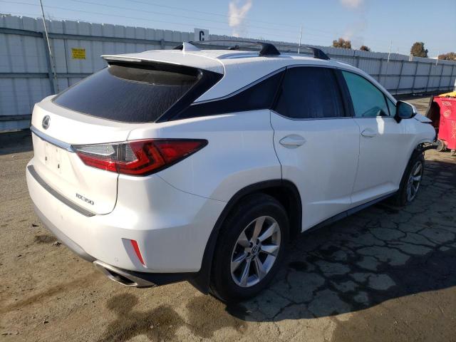 2T2BZMCA1KC181401 - 2019 LEXUS RX 350 BASE WHITE photo 3