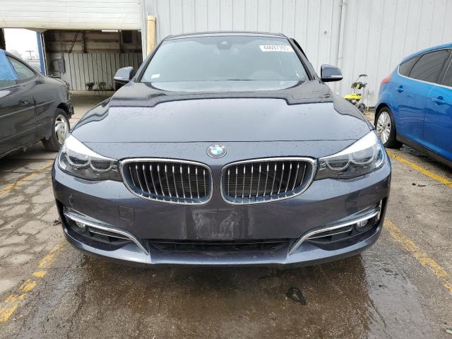 WBA8Z9C59JB220101 - 2018 BMW 330 XIGT BLUE photo 5