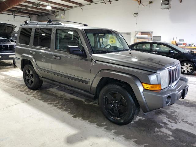 1J8HH48K57C535822 - 2007 JEEP COMMANDER GRAY photo 4