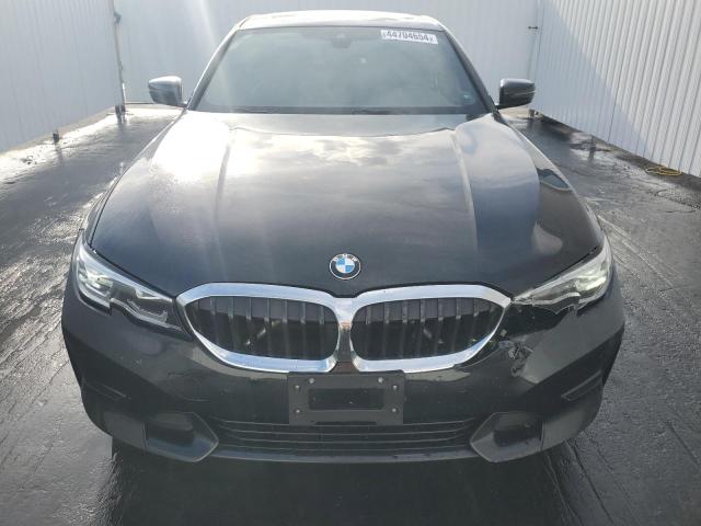 WBA5R7C08MFK49307 - 2021 BMW 330XI BLACK photo 5