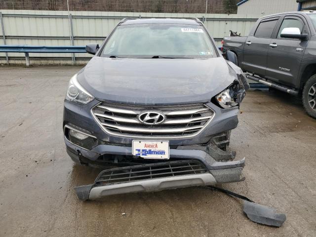 5NMZUDLB9HH028715 - 2017 HYUNDAI SANTA FE S BLUE photo 5