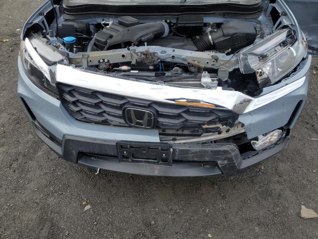 5FNYF8H57NB007391 - 2022 HONDA PASSPORT EXL BLUE photo 11