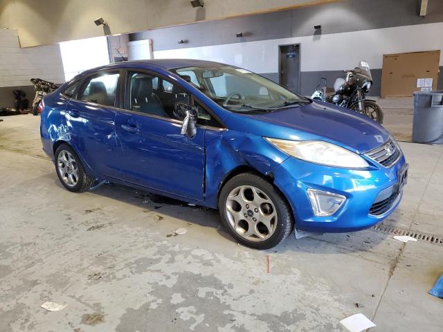 3FADP4CJ1BM109453 - 2011 FORD FIESTA SEL BLUE photo 4