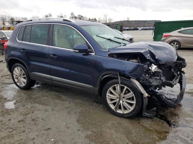 WVGAV7AX7DW556508 - 2013 VOLKSWAGEN TIGUAN S BLUE photo 4