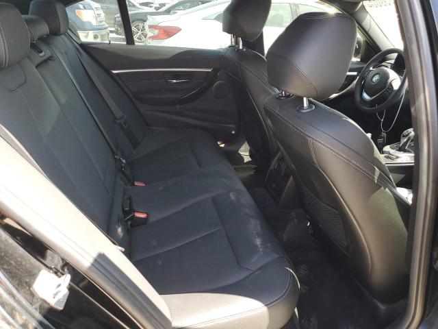 WBA8B9C50JK677013 - 2018 BMW 330 I Schwarz Foto 10