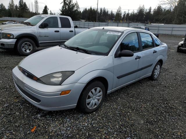 1FAFP33P44W107738 - 2004 FORD FOCUS LX SILVER photo 1