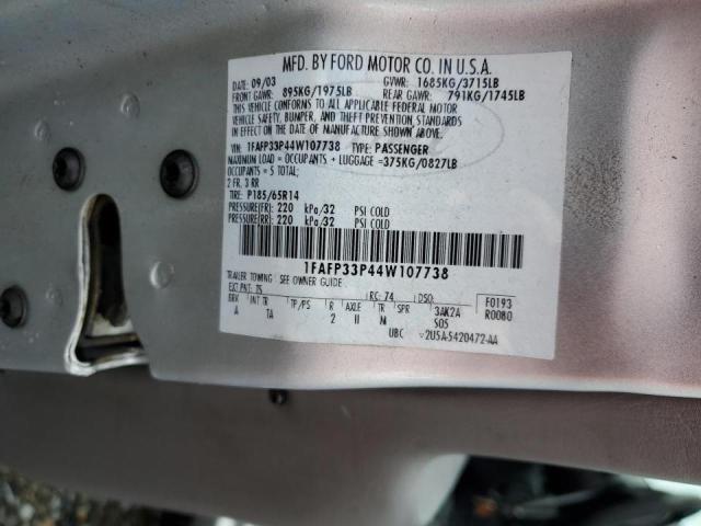 1FAFP33P44W107738 - 2004 FORD FOCUS LX SILVER photo 12