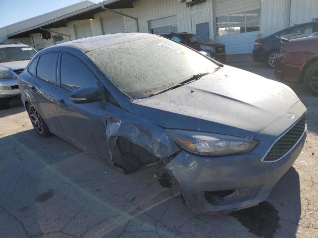 1FADP3H2XJL243924 - 2018 FORD FOCUS SEL BLUE photo 4