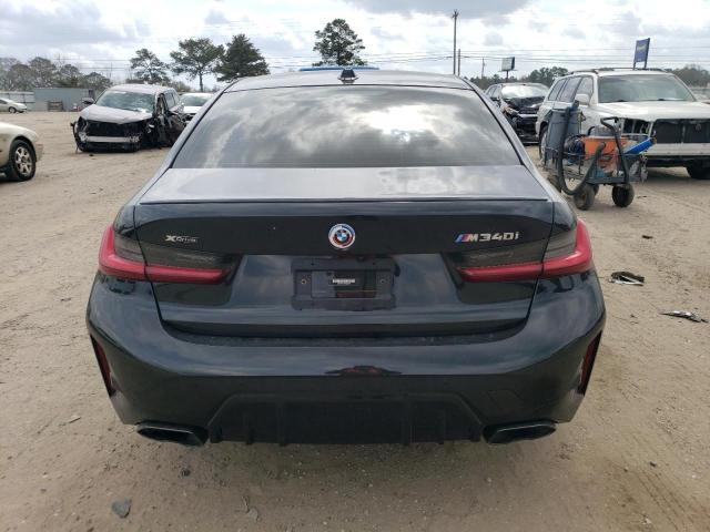 3MW49FF08P8D06328 - 2023 BMW M340XI BLACK photo 6