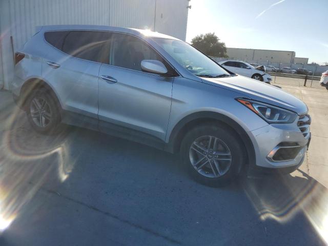 5XYZT3LB4HG455047 - 2017 HYUNDAI SANTA FE S SILVER photo 4