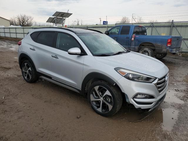 KM8J33A26HU337415 - 2017 HYUNDAI TUCSON LIMITED SILVER photo 4