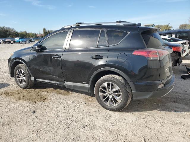 JTMRJREV2JD238813 - 2018 TOYOTA RAV4 HV LE BLACK photo 2