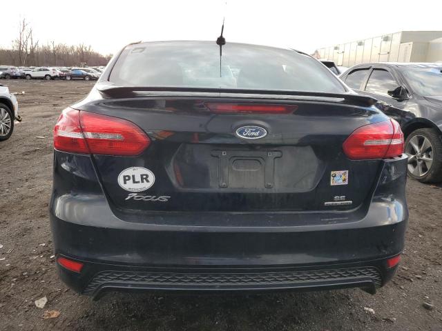 1FADP3F24GL369031 - 2016 FORD FOCUS SE BLACK photo 6