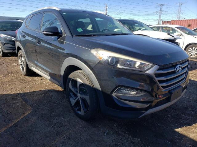 KM8J33A26HU273134 - 2017 HYUNDAI TUCSON LIMITED BLACK photo 4