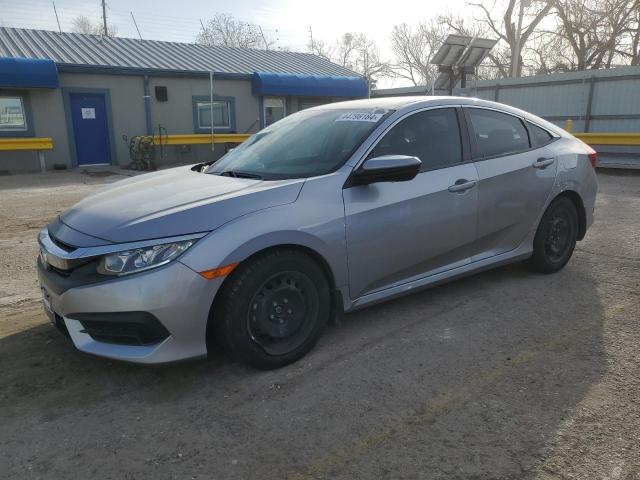 2HGFC2F52JH604079 - 2018 HONDA CIVIC LX SILVER photo 1