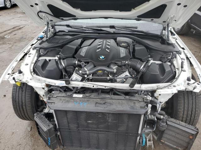 WBAFY4C58KBX39218 - 2019 BMW M850XI WHITE photo 11