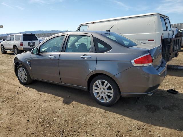 1FAHP37N29W199909 - 2009 FORD FOCUS SEL GRAY photo 2