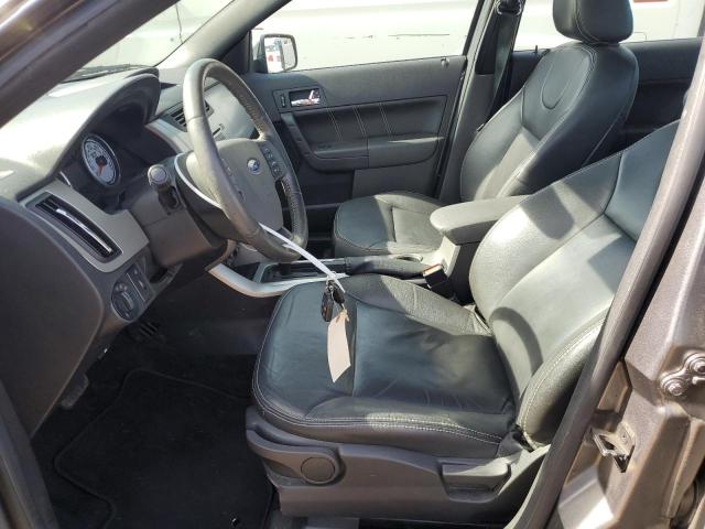 1FAHP37N29W199909 - 2009 FORD FOCUS SEL GRAY photo 7