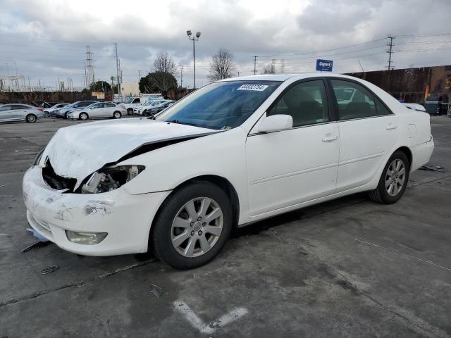 4T1BE32K45U557628 - 2005 TOYOTA CAMRY LE WHITE photo 1