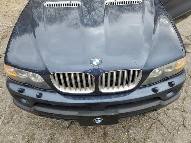 5UXFB53556LV29491 - 2006 BMW X5 4.4I BLUE photo 11