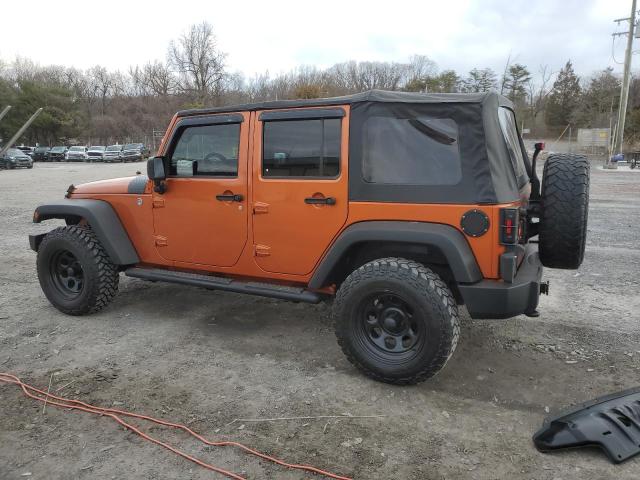 1J4HA3H1XAL211036 - 2010 JEEP WRANGLER U SPORT ნარინჯისფერი ფოტო 2