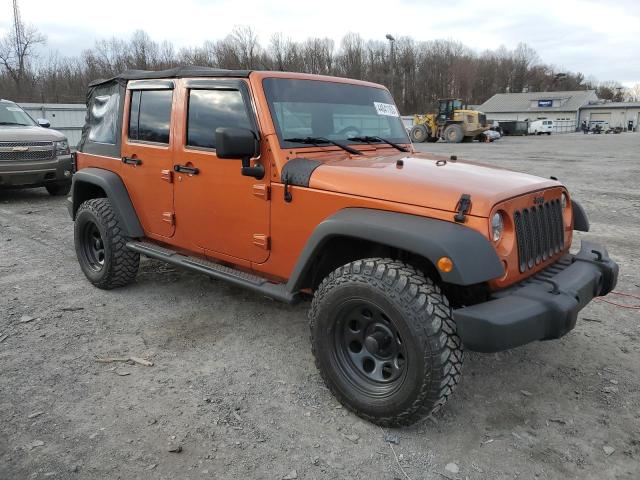 1J4HA3H1XAL211036 - 2010 JEEP WRANGLER U SPORT ნარინჯისფერი ფოტო 4