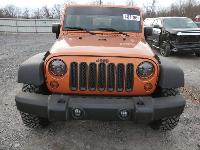 1J4HA3H1XAL211036 - 2010 JEEP WRANGLER U SPORT ნარინჯისფერი ფოტო 5