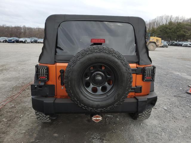 1J4HA3H1XAL211036 - 2010 JEEP WRANGLER U SPORT ORANGE photo 6