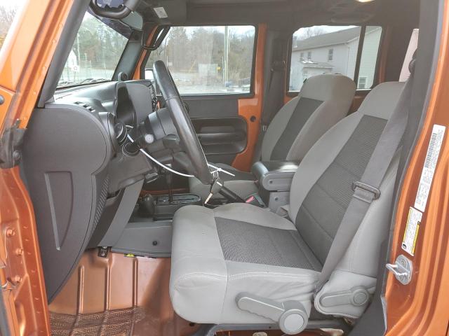 1J4HA3H1XAL211036 - 2010 JEEP WRANGLER U SPORT ნარინჯისფერი ფოტო 7