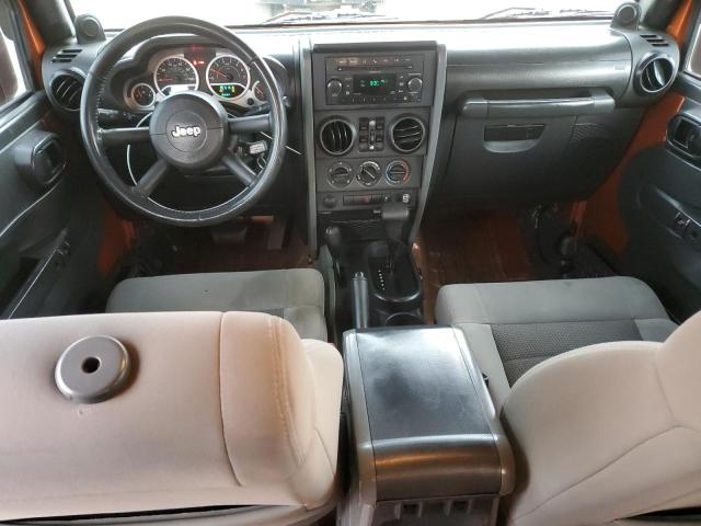 1J4HA3H1XAL211036 - 2010 JEEP WRANGLER U SPORT ნარინჯისფერი ფოტო 8