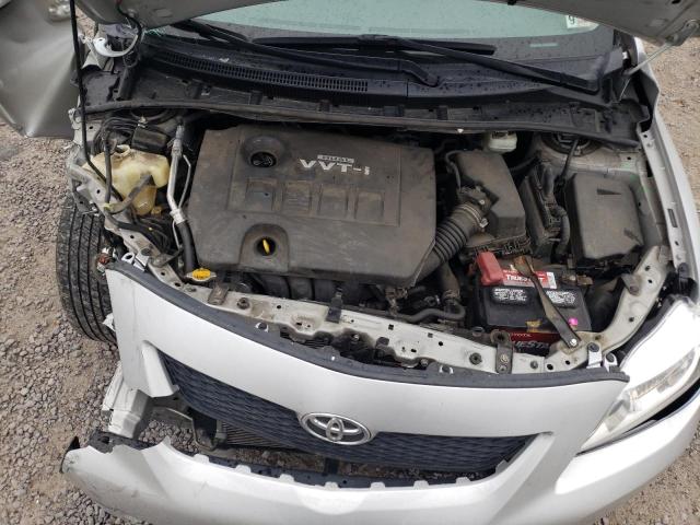 1NXBU4EE2AZ306972 - 2010 TOYOTA COROLLA BASE SILVER photo 11