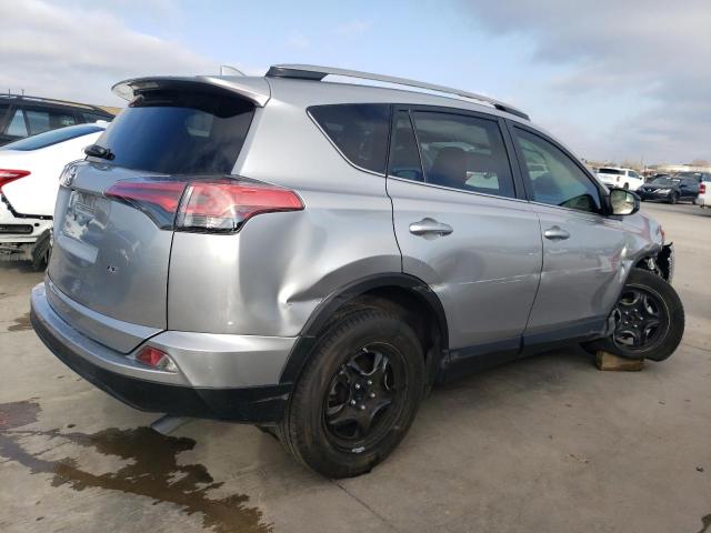 2T3ZFREVXHW370071 - 2017 TOYOTA RAV4 LE SILVER photo 3