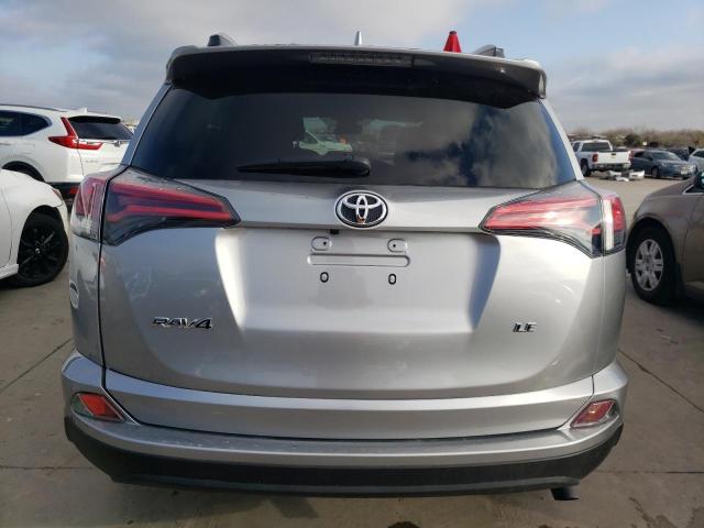 2T3ZFREVXHW370071 - 2017 TOYOTA RAV4 LE SILVER photo 6