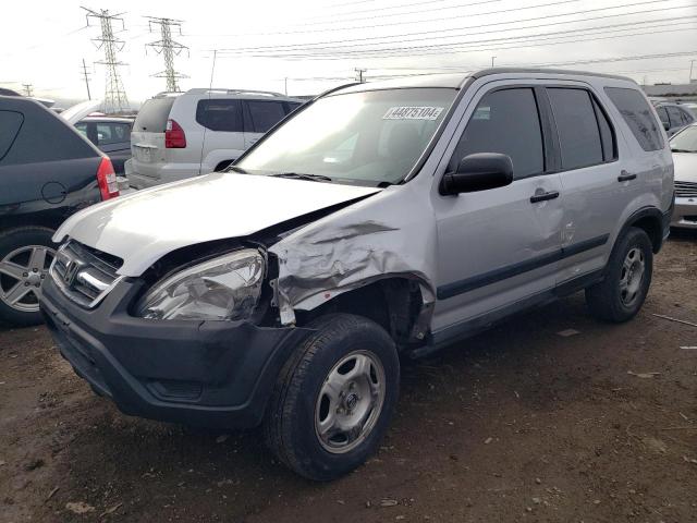 JHLRD78442C011597 - 2002 HONDA CR-V LX SILVER photo 1