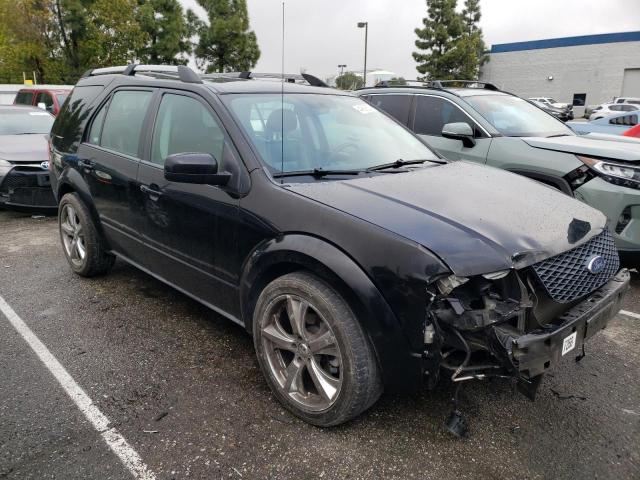 1FMDK03155GA74797 - 2005 FORD FREESTYLE LIMITED BLACK photo 4