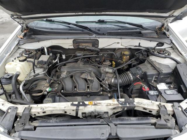 4F2CZ06134KM24169 - 2004 MAZDA TRIBUTE ES WHITE photo 12