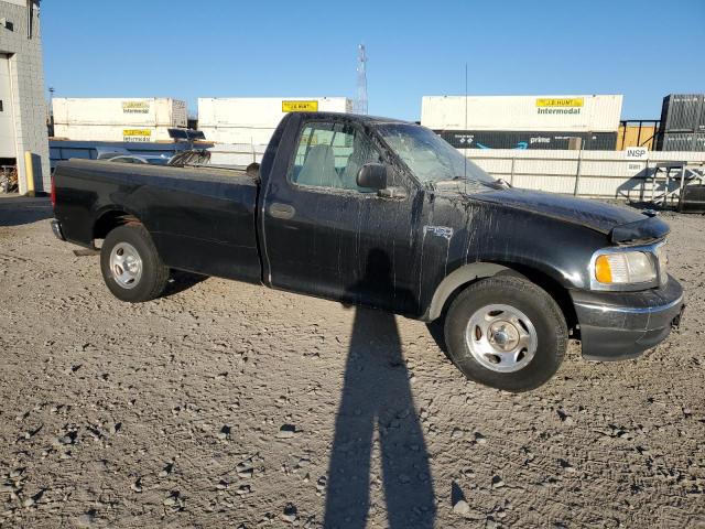 1FTZF1720YNB09799 - 2000 FORD F150 BLACK photo 4