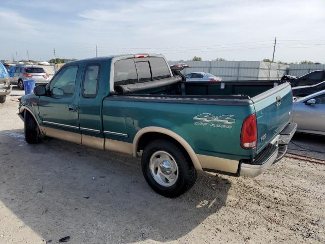 1FTDX18W1VND02337 - 1997 FORD F150 GREEN photo 2