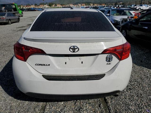 5YFBURHE5HP630888 - 2017 TOYOTA COROLLA L WHITE photo 6