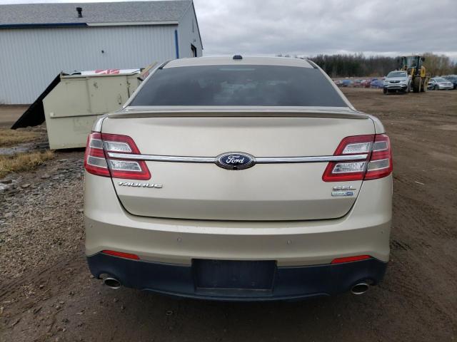 1FAHP2H87JG100020 - 2018 FORD TAURUS SEL GOLD photo 6