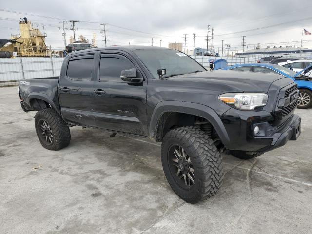 3TMAZ5CN0HM031174 - 2017 TOYOTA TACOMA DOUBLE CAB BLACK photo 4