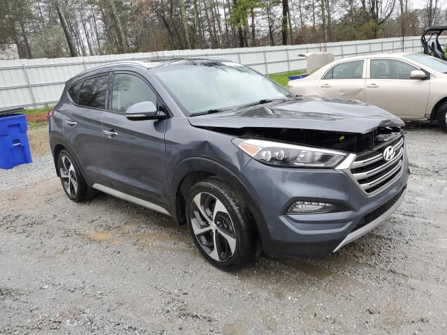 KM8J33A2XJU630997 - 2018 HYUNDAI TUCSON VALUE GRAY photo 4