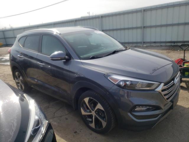 KM8J3CA20GU218516 - 2016 HYUNDAI TUCSON LIMITED GRAY photo 4