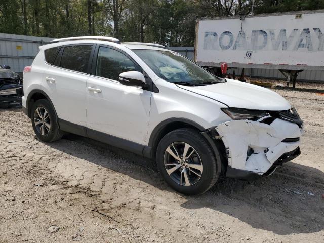 JTMWFREV5GJ099081 - 2016 TOYOTA RAV4 XLE WHITE photo 4