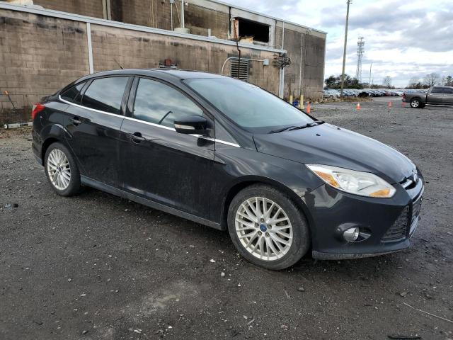 1FAHP3H25CL473746 - 2012 FORD FOCUS SEL BLACK photo 4