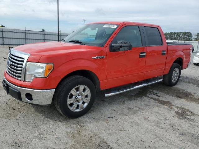 1FTFW1CF2BFC55666 - 2011 FORD F150 SUPERCREW RED photo 1