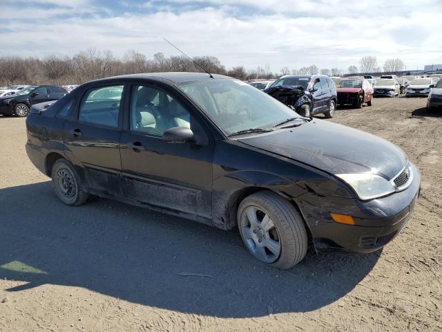 1FAHP34N26W249496 - 2006 FORD FOCUS ZX4 BLACK photo 4