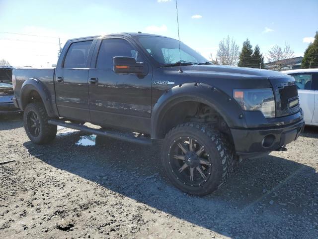 1FTFW1EF8EFB61907 - 2014 FORD F150 SUPERCREW BLACK photo 4